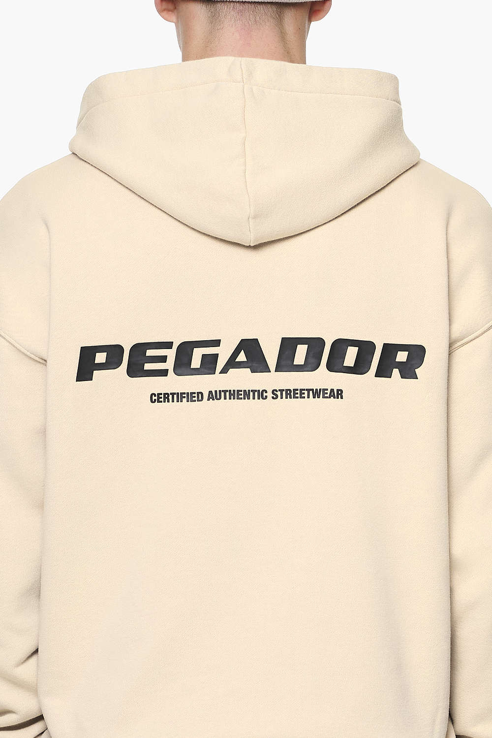 Pegador Colne Logo Oversized Hoodie Vintage Washed Kingdom Beige Gum Detailshot aus der Built to Last Kollektion für Herren