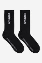 Pegador Certified Cross Logo Socks Black White Hauptansicht aus der Never Too Late Kollektion für Herren