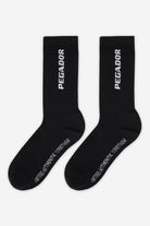 Pegador Certified Cross Logo Socks Black White Ganzkörper Bild aus der Never Too Late Kollektion für Herren