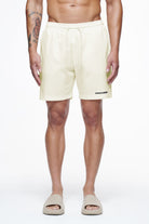 Pegador Logo Swim Shorts Unbleached Hauptansicht aus der Finer Things Kollektion für Herren