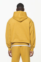 Pegador Logo Oversized Hoodie Vintage Washed Mustard Gegenansicht aus der Built to Last Kollektion für Herren