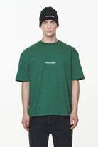 Pegador Colne Logo Oversized Tee Vintage Washed British Green Gum Seitenansicht aus der Built to Last Kollektion für Herren