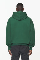 Pegador County Oversized Hoodie Vintage Washed British Green Gegenansicht aus der Built to Last Kollektion für Herren