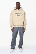 Pegador Comet Oversized Hoodie Vintage Washed Kingdom Beige Ganzkörper Bild aus der Built to Last Kollektion für Herren