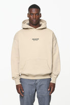 Pegador Mouncy Oversized Hoodie Vintage Washed Kingdom Beige Seitenansicht aus der Built to Last Kollektion für Herren