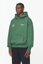 Pegador Dike Oversized Hoodie Vintage British Green Gegenansicht aus der Built to Last Kollektion für Herren