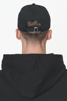 Pegador Champ Cap Onyx Black Seitenansicht aus der Built to Last Kollektion für Herren