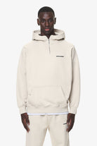 Pegador Logo Oversized Halfzip Hoodie Washed Dust Cream Gum Hauptansicht aus der Do not Disturb Kollektion für Herren