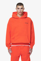 Pegador Logo Oversized Hoodie Washed Signal Red Gum Hauptansicht aus der Do not Disturb Kollektion für Herren