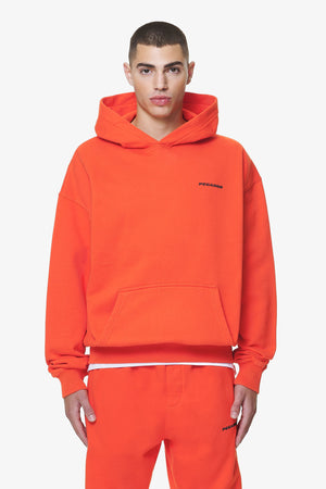 Pegador Logo Oversized Hoodie Washed Signal Red Gum Hauptansicht aus der Do not Disturb Kollektion für Herren