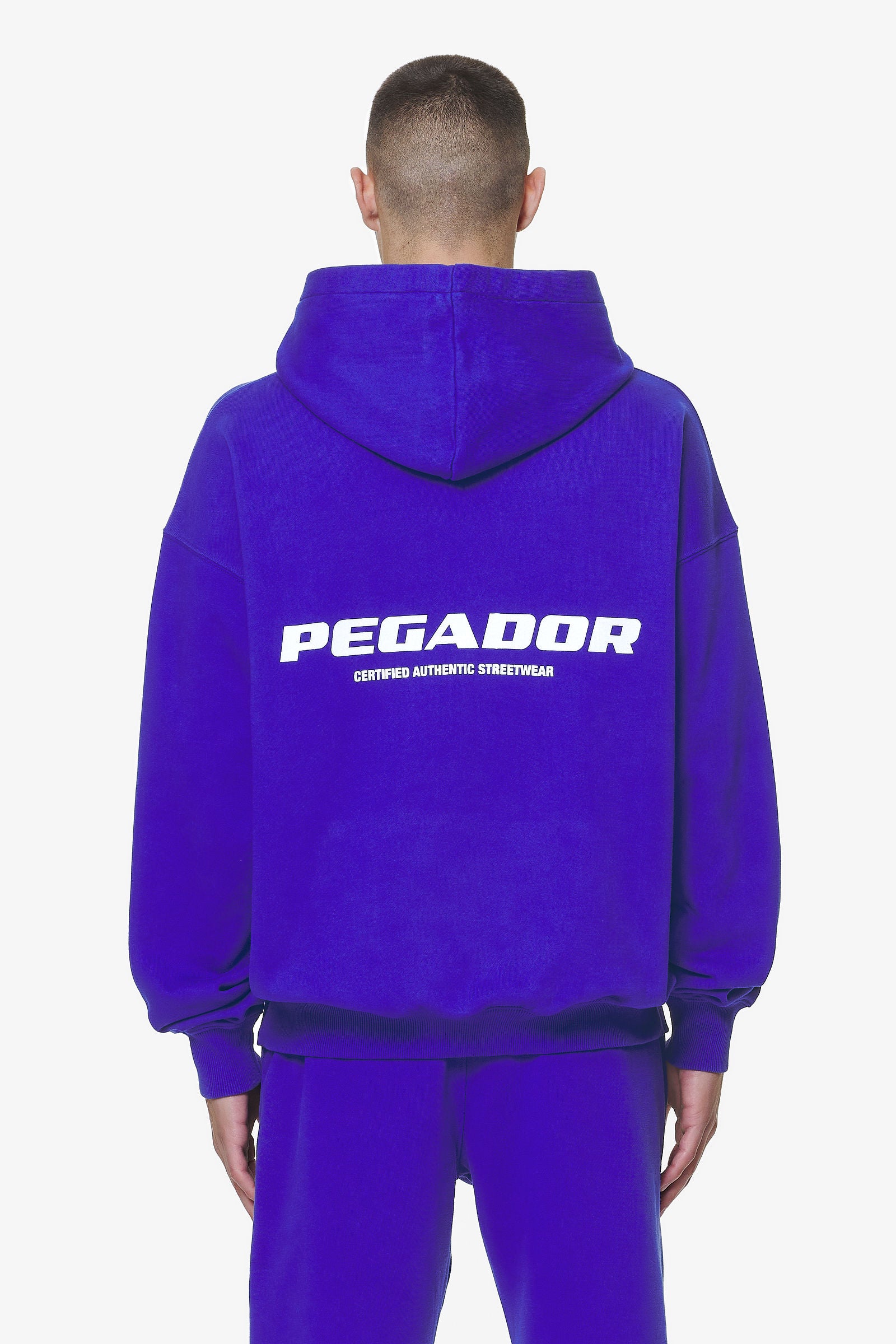 Pegador Colne Logo Oversized Hoodie Washed Endless Blue Hauptansicht aus der Do not Disturb Kollektion für Herren