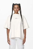 Pegador Navisk Heavy Oversized Tee Washed Salty Cream Seitenansicht aus der Do not Disturb Kollektion für DaHerren