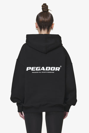 Pegador Atna Logo Oversized Hoodie Black Hauptansicht aus der Do not Disturb Kollektion für DaHerren