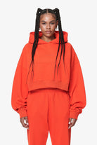 Pegador Salita Oversized Cropped Hoodie Washed Signal Red Gum Hauptansicht aus der Do not Disturb Kollektion für DaHerren