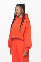 Pegador Salita Oversized Cropped Hoodie Washed Signal Red Gum Seitenansicht aus der Do not Disturb Kollektion für DaHerren