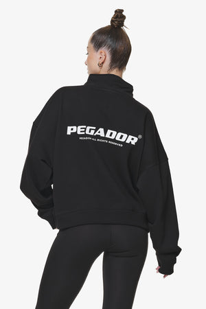 Pegador Vuku Logo Oversized Halfzip Black Hauptansicht aus der Do not Disturb Kollektion für DaHerren