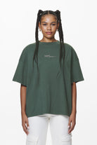 Pegador Navisk Heavy Oversized Tee Washed Sage Green Seitenansicht aus der Do not Disturb Kollektion für DaHerren