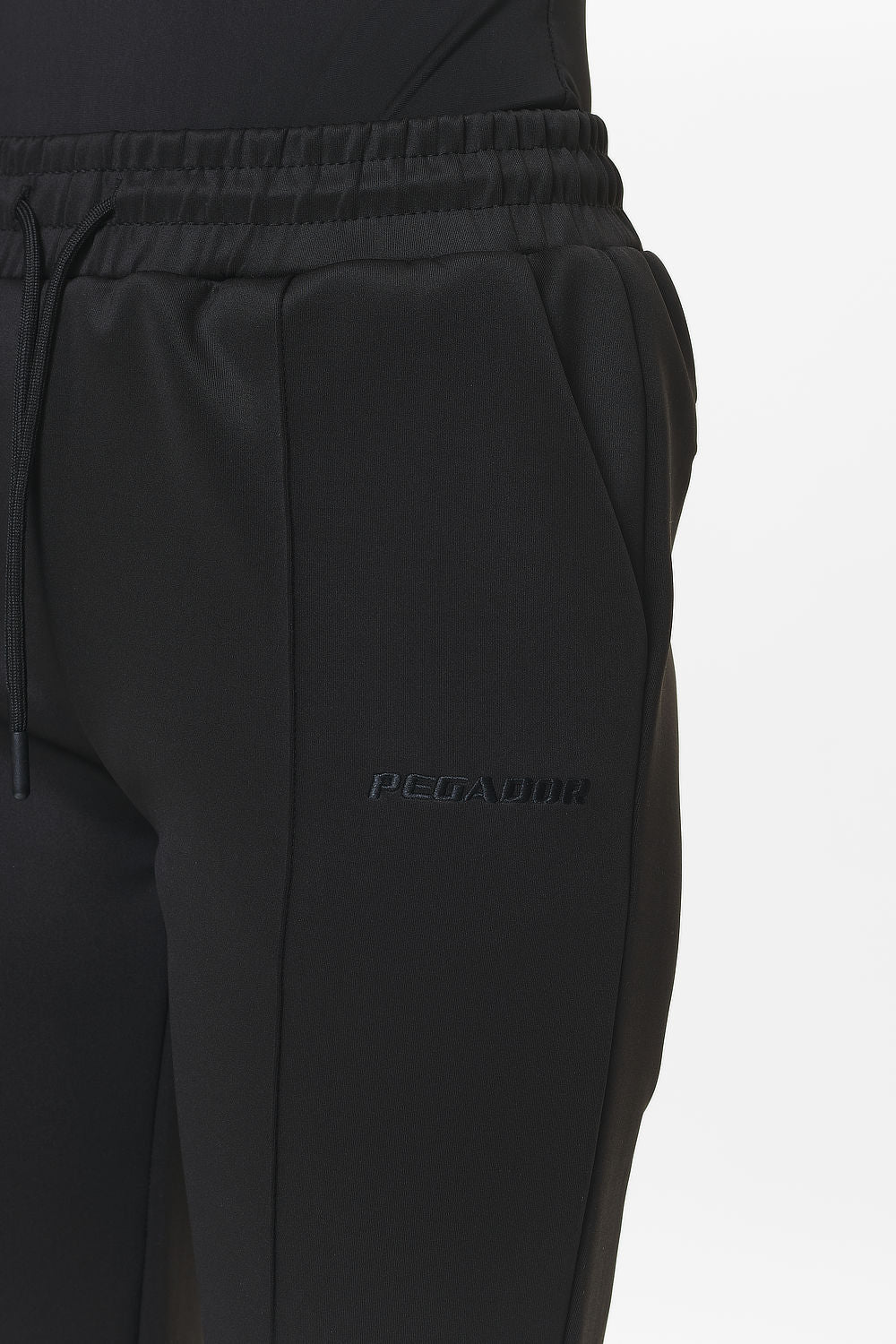 Pegador Clair Flared Track Pants Black Detailshot aus der Do not Disturb Kollektion für DaHerren