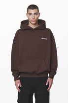 Pegador Crail Oversized Hoodie Washed Oak Brown Seitenansicht aus der Do not Disturb Kollektion für Herren