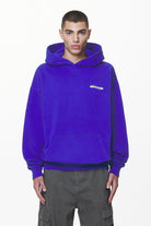 Pegador Crail Oversized Hoodie Washed Endless Blue Seitenansicht aus der Do not Disturb Kollektion für Herren