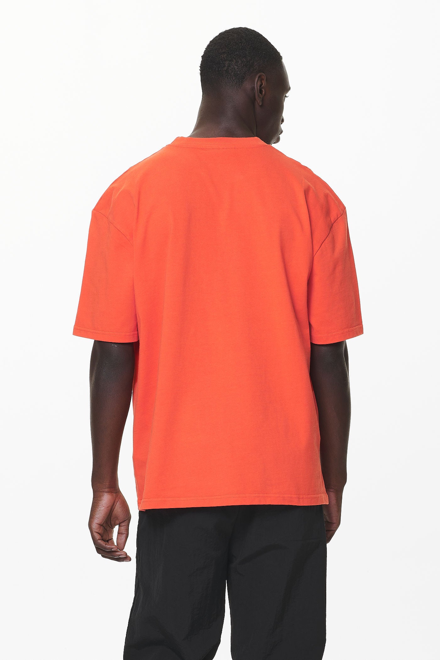 Pegador Eazor Oversized Tee Washed Signal Red Seitenansicht aus der Do not Disturb Kollektion für Herren