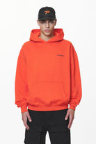 Pegador Devon Oversized Hoodie Washed Signal Red Seitenansicht aus der Do not Disturb Kollektion für Herren