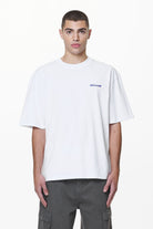 Pegador Sanit Oversized Tee White Seitenansicht aus der Do not Disturb Kollektion für Herren