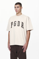 Pegador Layton Oversized Tee Washed Dust Cream Seitenansicht aus der Do not Disturb Kollektion für Herren