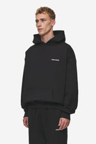 Pegador Logo Oversized Hoodie Washed Black Seitenansicht aus der Most Alive Kollektion für Herren