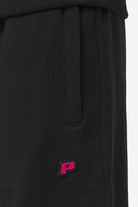 Pegador Leono Loose Sweat Pants Washed Black Virtual Pink Gum Detailshot aus der Most Alive Kollektion für Herren