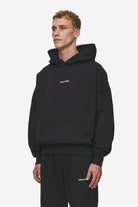 Pegador Logo Boxy Hoodie Washed Black Seitenansicht aus der Most Alive Kollektion für Herren