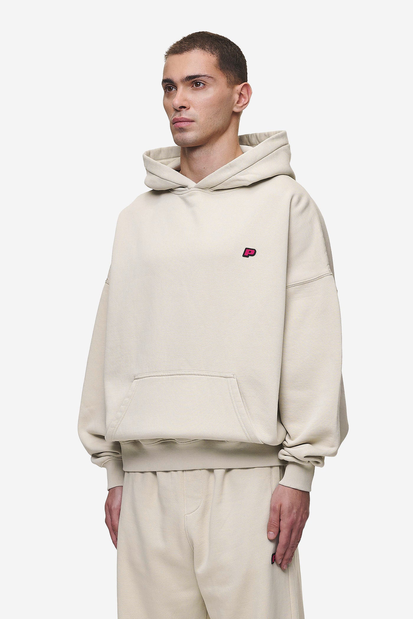 Pegador Leono Boxy Hoodie Washed Light Beige Virtual Pink Gum Seitenansicht aus der Most Alive Kollektion für Herren