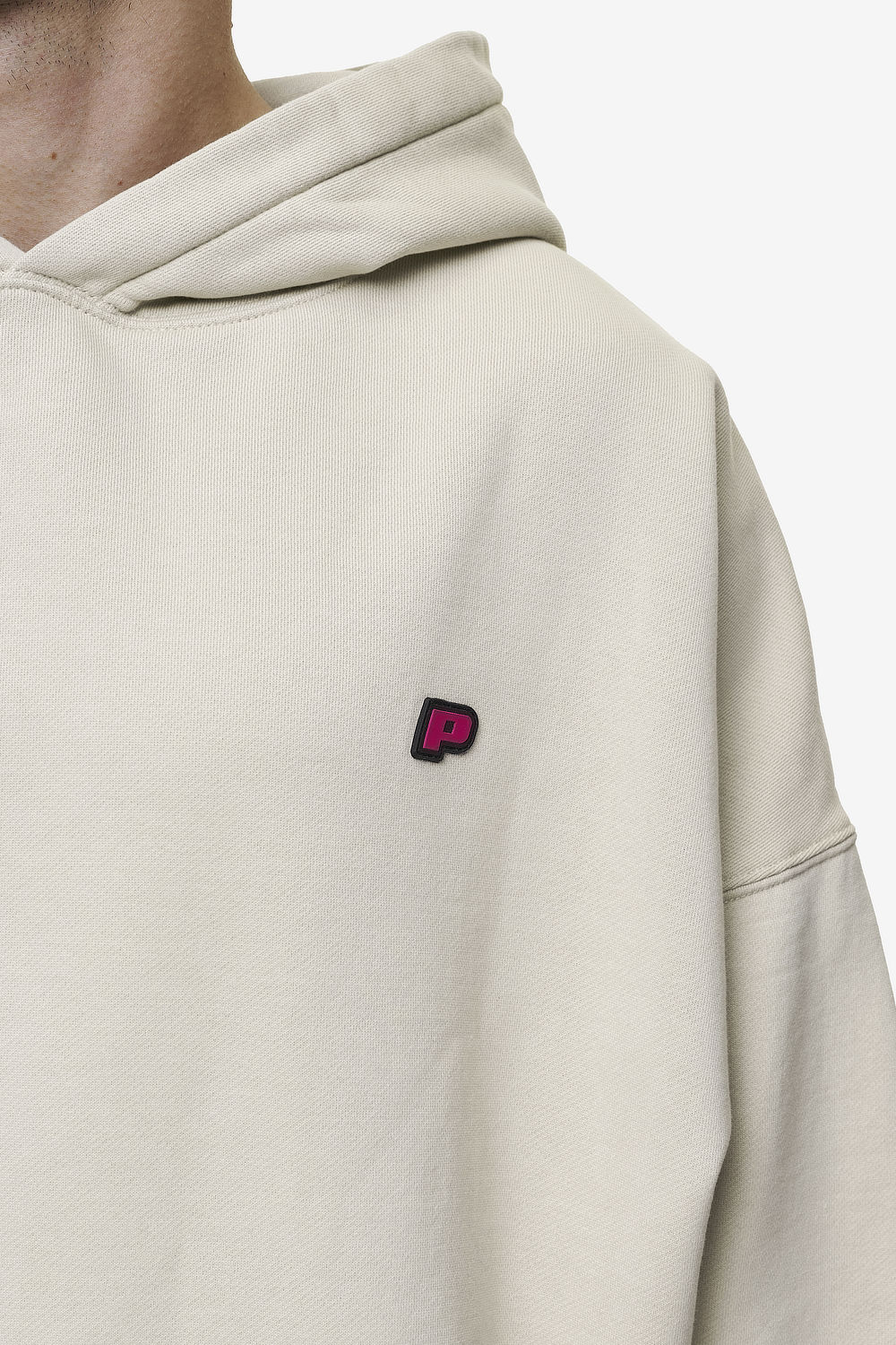 Pegador Leono Boxy Hoodie Washed Light Beige Virtual Pink Gum Detailshot aus der Most Alive Kollektion für Herren