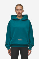 Pegador Nisa Oversized Hoodie Washed Urban Turquoise Seitenansicht aus der Most Alive Kollektion für DaHerren