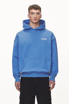 Pegador Bass Oversized Hoodie Washed Retro Blue Seitenansicht aus der Never Too Late Kollektion für Herren