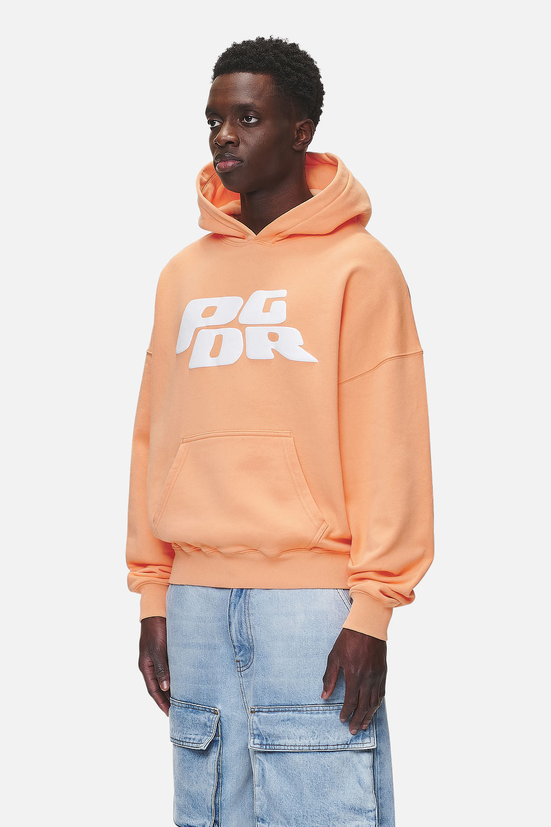 Pegador Danico Boxy Hoodie Washed Apricot Seitenansicht aus der Never Too Late Kollektion für Herren