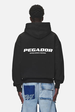 Pegador Colne Logo Oversized Hoodie Washed Black Hauptansicht aus der Never Too Late Kollektion für Herren