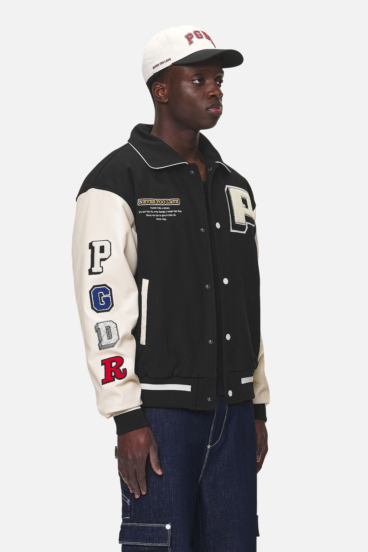 Pegador Oris Varsity Jacket Black Cream Seitenansicht aus der Never Too Late Kollektion für Herren