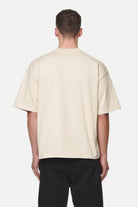 Pegador Logo Boxy Tee Washed Desert Sand Black Gum Gegenansicht aus der Never Too Late Kollektion für Herren