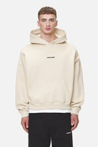 Pegador Logo Boxy Hoodie Washed Desert Sand Black Gum Hauptansicht aus der Never Too Late Kollektion für Herren