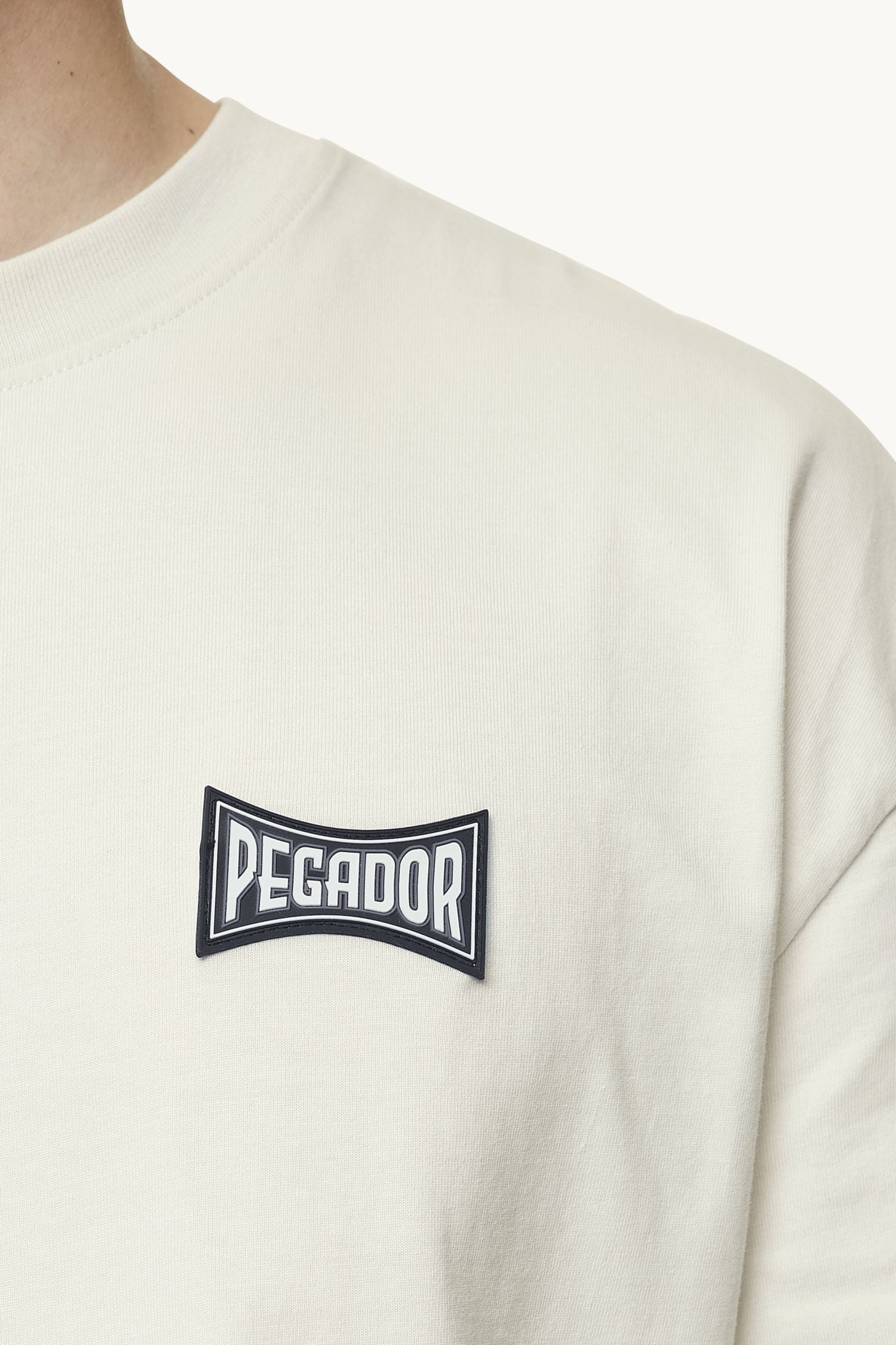 Pegador Dacko Oversized Tee Washed Salty Cream Black Detailshot aus der Next Wave Kollektion für Herren