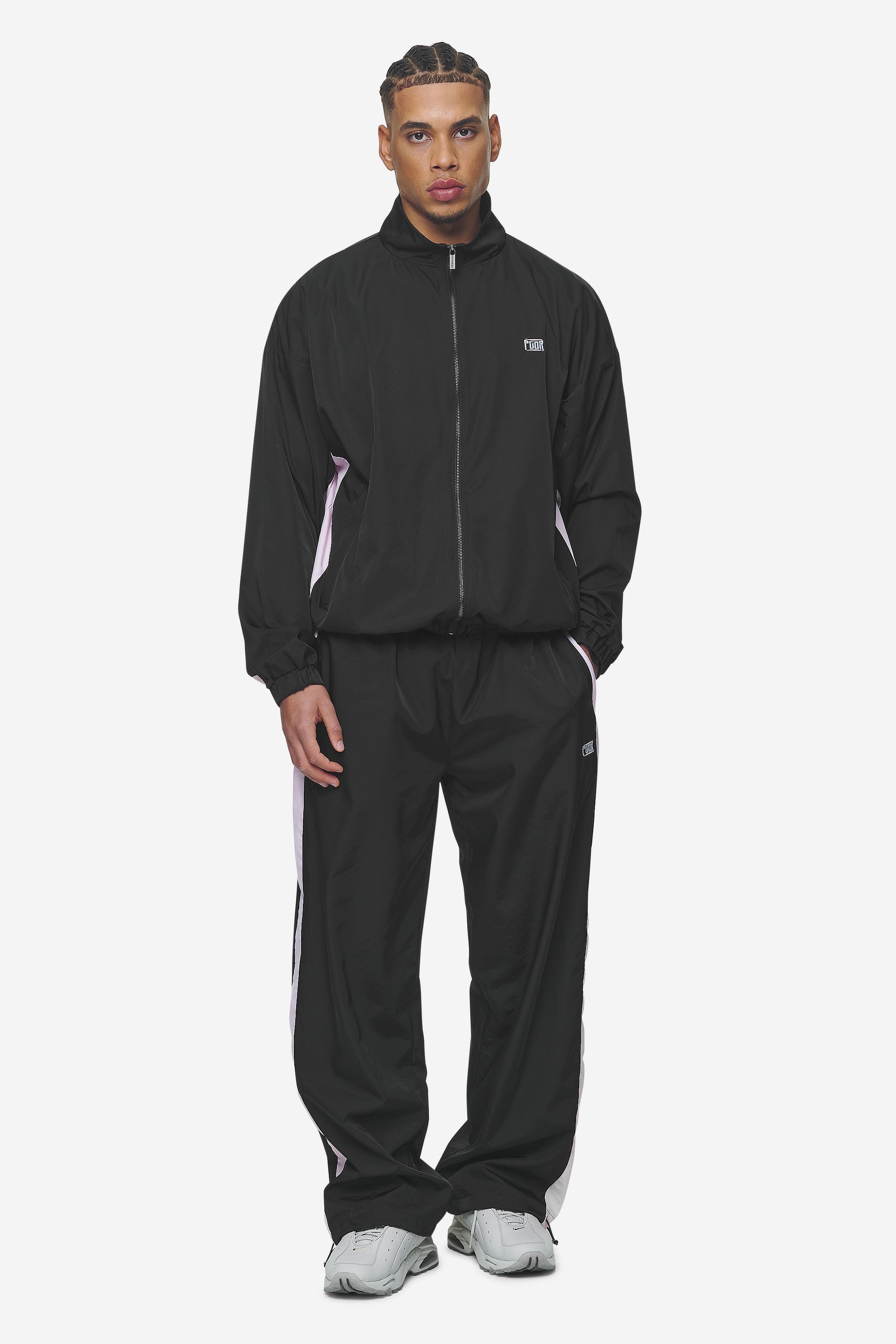 Pegador Stow Wide Track Pants Black Bubblegum Ganzkörper Bild aus der Next Wave Kollektion für Herren