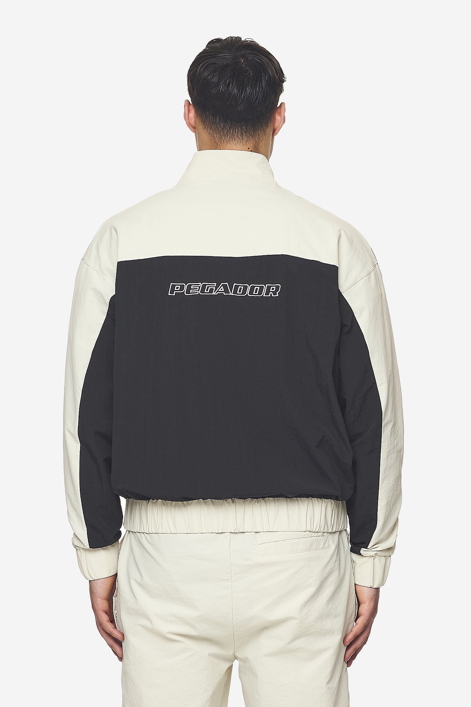 Pegador Wolsey Track Jacket Salty Cream Black Gegenansicht aus der Next Wave Kollektion für Herren