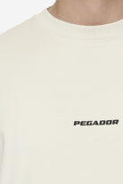 Pegador Logo Boxy Tee Washed Salty Cream Black Gum Detailshot aus der Next Wave Kollektion für Herren