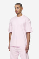 Pegador Logo Oversized Tee Washed Bubblegum White Gum Seitenansicht aus der Next Wave Kollektion für Herren