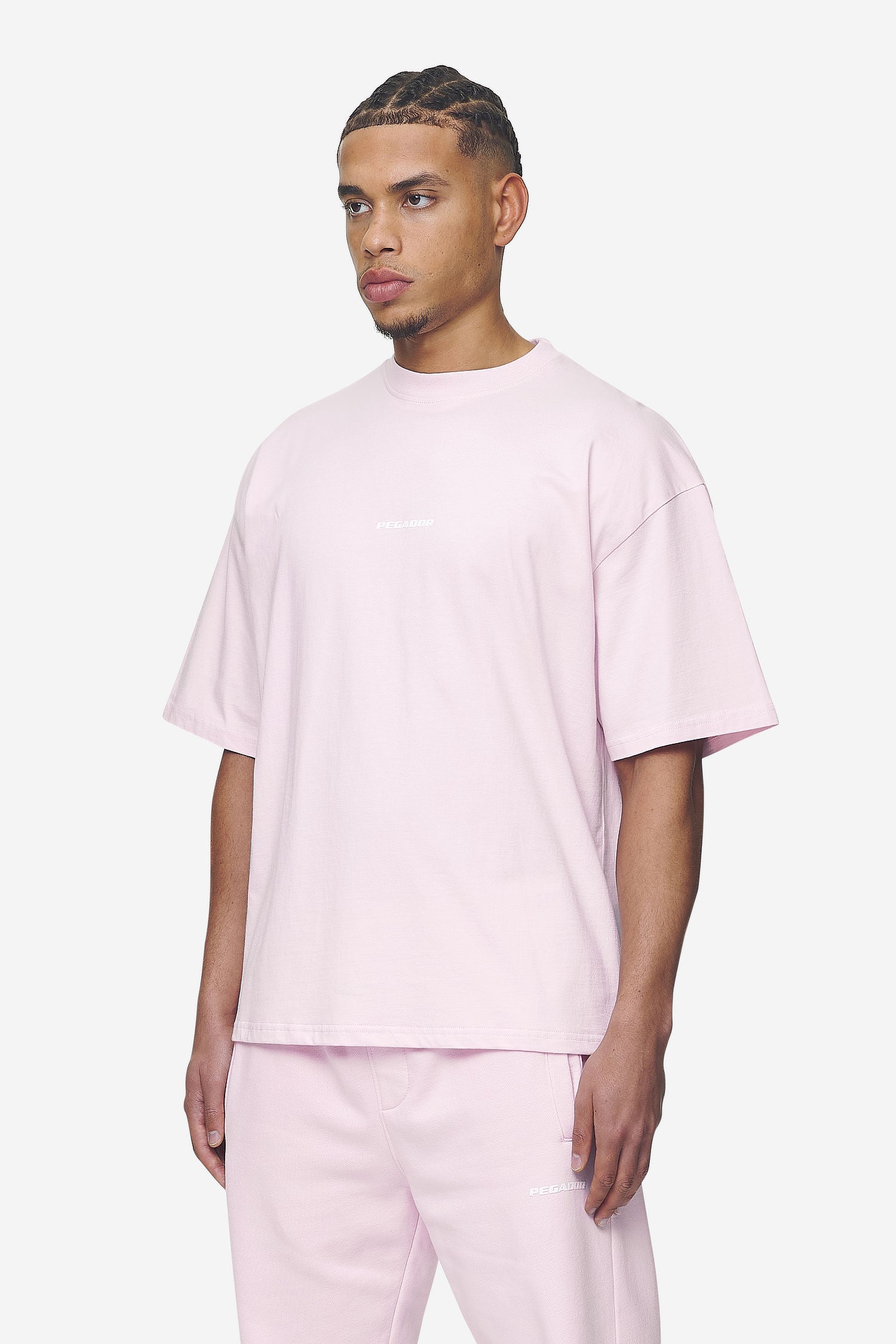 Pegador Logo Boxy Tee Washed Bubblegum White Gum Seitenansicht aus der Next Wave Kollektion für Herren