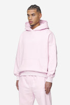 Pegador Logo Boxy Hoodie Washed Bubblegum White Gum Seitenansicht aus der Next Wave Kollektion für Herren