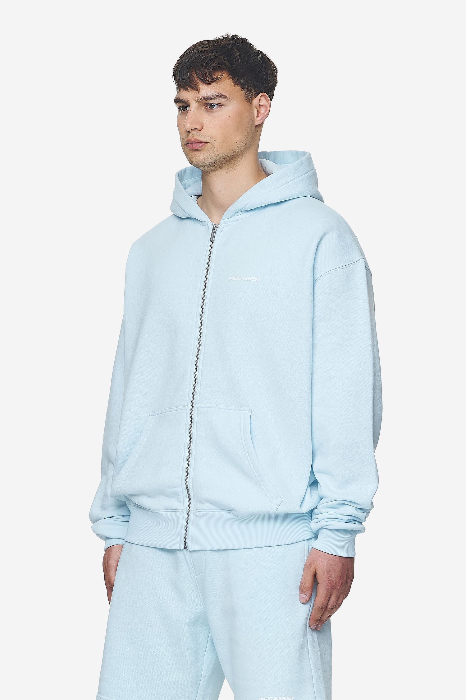 Pegador Logo Oversized Sweat Jacket Washed Baby Blue White Gum Seitenansicht aus der Next Wave Kollektion für Herren