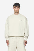 Pegador Logo Oversized Sweater Washed Salty Cream Black Gum Hauptansicht aus der Next Wave Kollektion für Herren