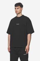 Pegador Logo Boxy Tee Washed Black White Gum Seitenansicht aus der Next Wave Kollektion für Herren